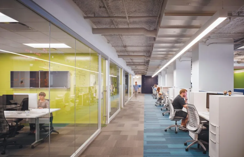 Open-plan office with flexible desks and modular furniture
