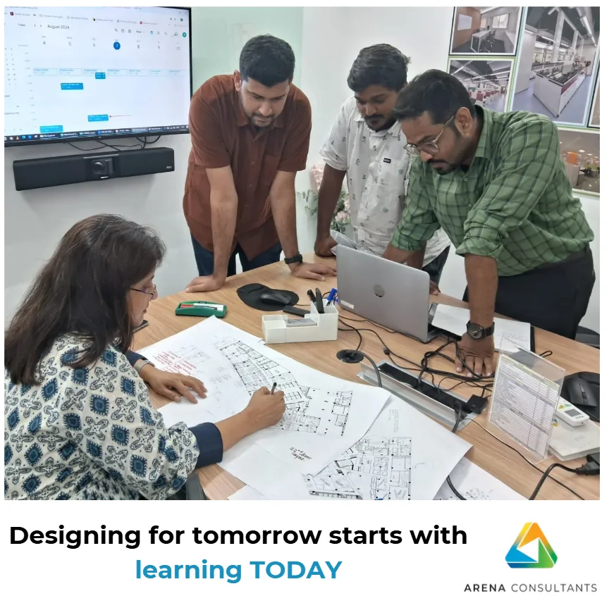 Lab design team in discussion with scientists and industry experts