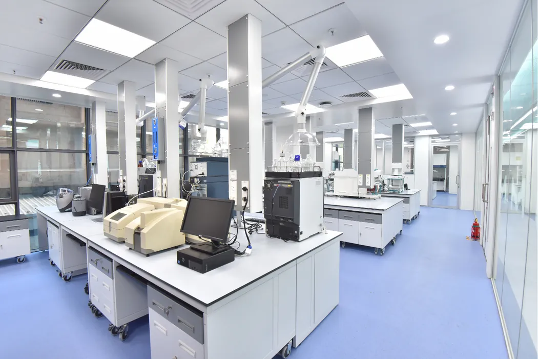 Analytical instrument laboratory with chromatography systems and snorkel extractors