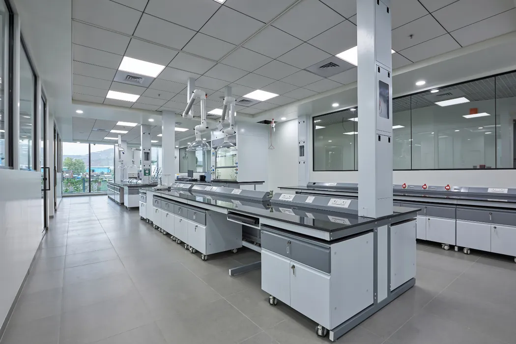 Daylit laboratory with island benches and snorkel extractors