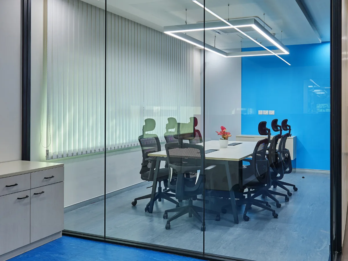 Glass meeting room with blue accent, Ambernath