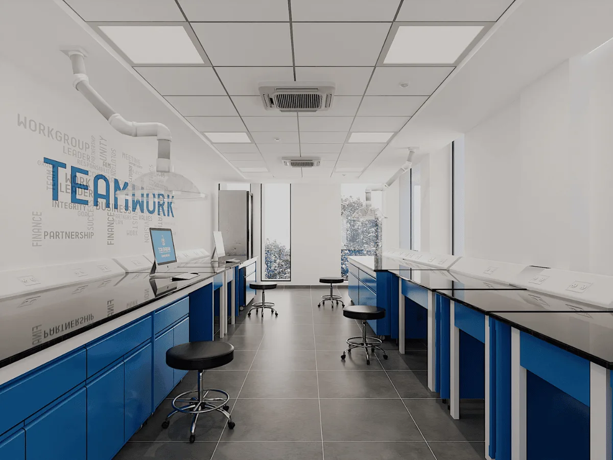 Dual bench runs with spot extractors and Teamwork wall graphic