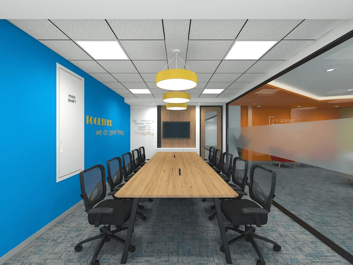 Conference room with blue accent wall, yellow pendant lights, and whiteboard walls