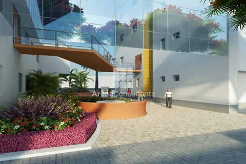 Landscaped entrance courtyard with glass facade and flowering planters