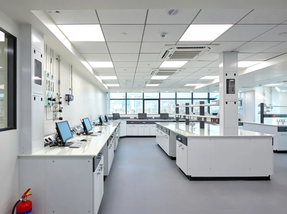 Instrumentation area with computers, gas manifold valves and island benches